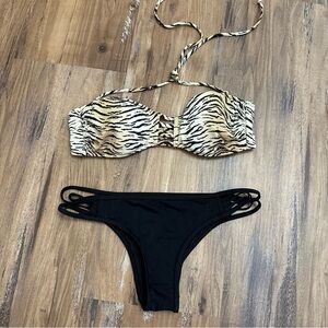 Victoria’s Secret tiger strip bikini halter top and the itsy strap bikini bottom